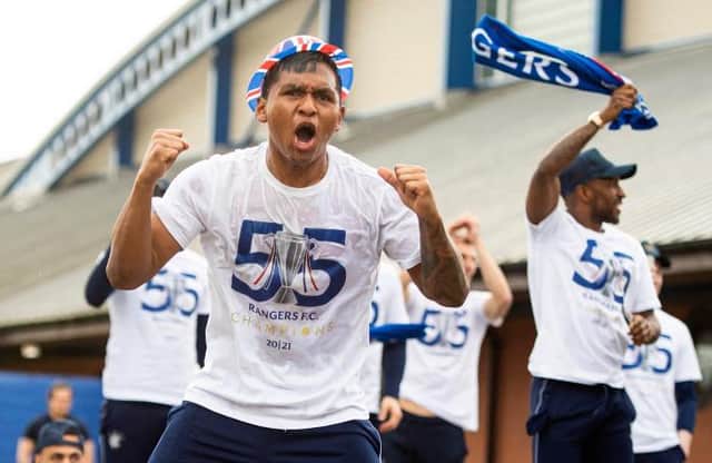 Alfredo Morelos celebrates outside the Rangers training ground on the day the Ibrox club clinched the Premiership title. (Photo by Ross MacDonald / SNS Group)