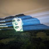 An image of actor Anna Karina from the film Vivre Sa Vie was projected onto Salisbury Crags in Edinburgh last month as part of a campaign to save the Edinburgh International Film Festival and the Filmhouse cinema in the city. (Picture: Jane Barlow/PA)