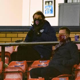Hearts manager Robbie Neilson in the stand at Inverness with sporting director Joe Savage and club ambassador Gary Locke.
