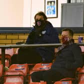Hearts manager Robbie Neilson in the stand at Inverness with sporting director Joe Savage and club ambassador Gary Locke.