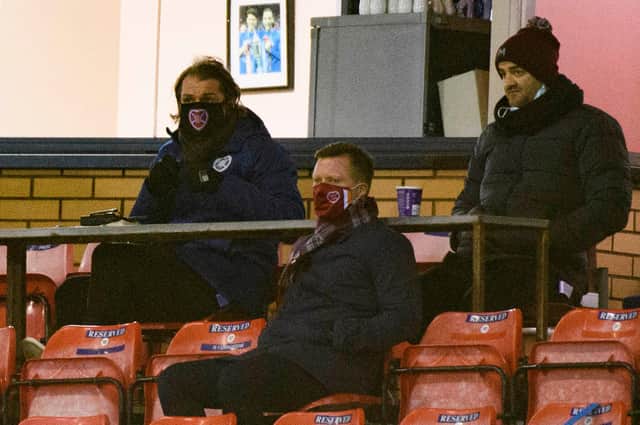 Hearts manager Robbie Neilson in the stand at Inverness with sporting director Joe Savage and club ambassador Gary Locke.