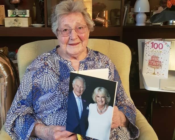 Ruth Park-Pearson holding one of the first 100-year-old birthday cards