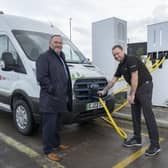 First Bus Scotland commercial director Graeme Macfarlan (L) with DPD staff manager David Scott.