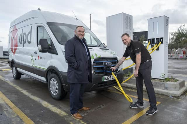 First Bus Scotland commercial director Graeme Macfarlan (L) with DPD staff manager David Scott.