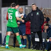 Hibs' Lewis Stevenson is substituted off by manager Nick Montgomery.