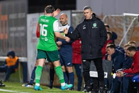 Hibs' Lewis Stevenson is substituted off by manager Nick Montgomery.