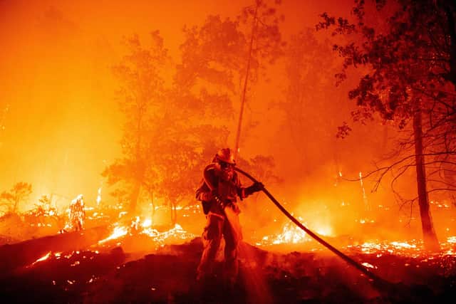 Wildfires, like this one in Madera County, California, are just one of an array of threats that are getting worse because of climate change (Picture: Josh Edelson/AFP via Getty Images)