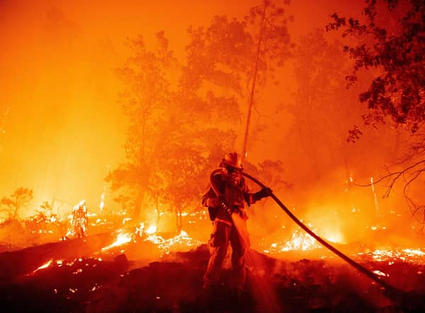 Wildfires, like this one in Madera County, California, are just one of an array of threats that are getting worse because of climate change (Picture: Josh Edelson/AFP via Getty Images)