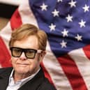 Sir Elton John visited to South Africa in February with a group of US senators to assess the impact of US-funded HIV-Aids schemes (Picture: Paul Botes/AFP via Getty Images)