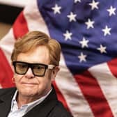 Sir Elton John visited to South Africa in February with a group of US senators to assess the impact of US-funded HIV-Aids schemes (Picture: Paul Botes/AFP via Getty Images)