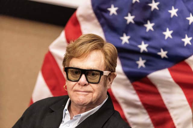 Sir Elton John visited to South Africa in February with a group of US senators to assess the impact of US-funded HIV-Aids schemes (Picture: Paul Botes/AFP via Getty Images)