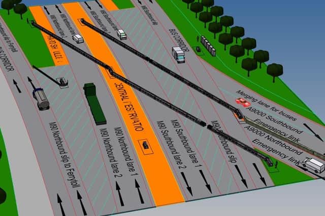 The barriers will be moved across the Queensferry Crossing carriageways (north end shown) to direct traffic to and from the adjacent Forth Road Bridge (to the right) when required. Picture: BEAR Scotland