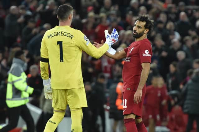 Mohamed Salah of Liverpool with Allan McGregor of Rangers at the  end UEFA Champions League group A match between Liverpool FC and Rangers FC at Anfield on October 04, 2022 in Liverpool, England. (Photo by Nick Taylor/Liverpool FC/Liverpool FC via Getty Images)