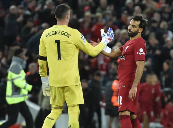 Mohamed Salah of Liverpool with Allan McGregor of Rangers at the  end UEFA Champions League group A match between Liverpool FC and Rangers FC at Anfield on October 04, 2022 in Liverpool, England. (Photo by Nick Taylor/Liverpool FC/Liverpool FC via Getty Images)