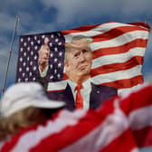 A flag featuring former President Donald Trump that supporters are flying near his Mar-a-Lago home (Photo by Joe Raedle/Getty Images)