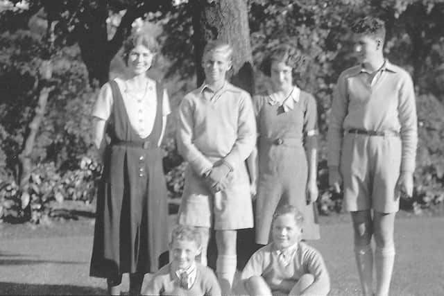 The photo which features in the visitors book of Prince Philip's visit to George Square in Edinburgh in 1935. From left: Granny Minou Bartholomew, Philip of Greece, Aunt Ailie, Matthias Paneth, front: Uncles Robbie and Pete. Pic copyright: Image reproduced with kind permission of the Bartholomew Family.