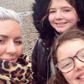 Adele Hughes with her daughters Siena and Elise.