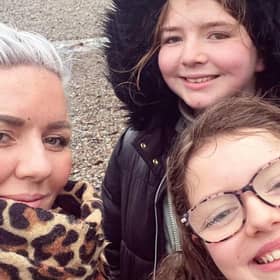 Adele Hughes with her daughters Siena and Elise.