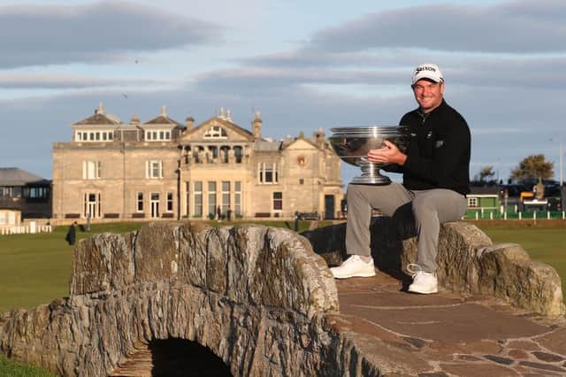 Ryan Fox of New Zealand poses with the trophy on the Swilcan Bridge after winning the Alfred Dunhill Links Championship on the Old Course at St Andrews. Picture: Jan Kruger/Getty Images.
