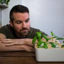 Conor Gallagher, the GSA-trained architect from Belfast now based in London, poses with his GrowPod - a bamboo hydroponic planter looking to offer a sustainable, affordable way to grow fruit, veg and plants indoors despite limited space