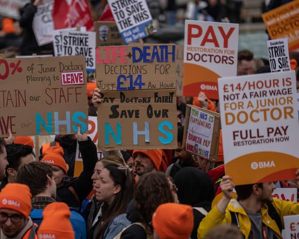 Scotland's junior doctors have threatened strike action similar to that seen south of the border unless its pay restoration demands are met. Picture: Carl Court/Getty Images
