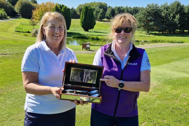 Lochgelly duo Ruth Kinnell and Linda Watson show off the trophy after winning the 2023 Commonwealth Spoons at Kings Acre. Picture: Scottish Golf