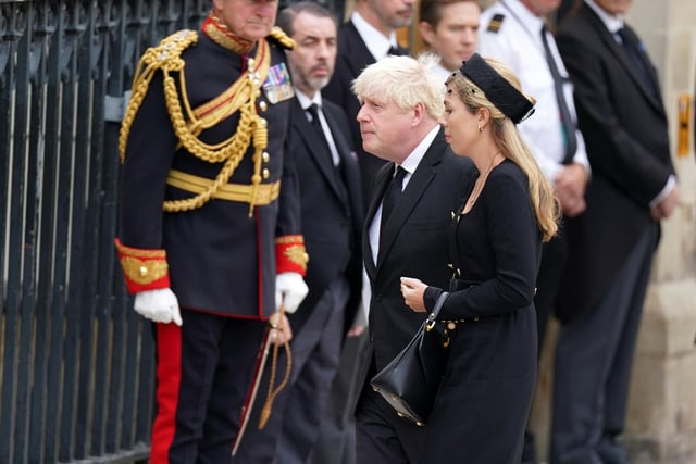 Former Prime Minister Boris Johnson and wife Carrie arrives for the State Funeral of Queen Elizabeth II, held at Westminster Abbey, London. Picture date: Monday September 19, 2022.
