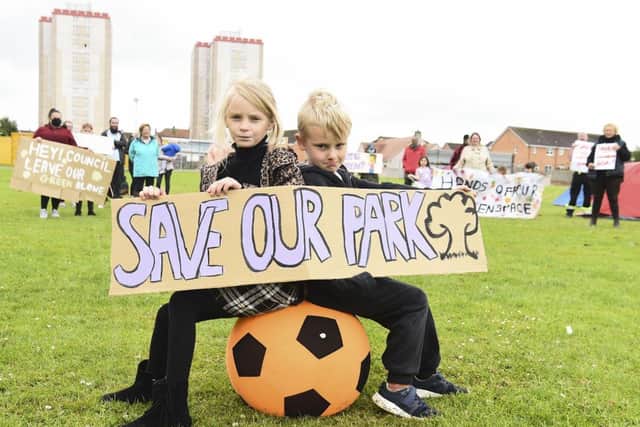 Moredun residents campaign to save their park from developers who want to build flats on site kids Bonnie Wright, 7, and her brother Shuggie Wright, 6