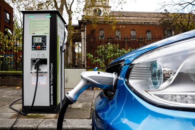 Electric cars can help cut emissions, but governments need to create charging-point networks, energy companies need to provide renewable electricity and the vehicles need to be cheaper (Picture: Miles Willis/Getty Images)