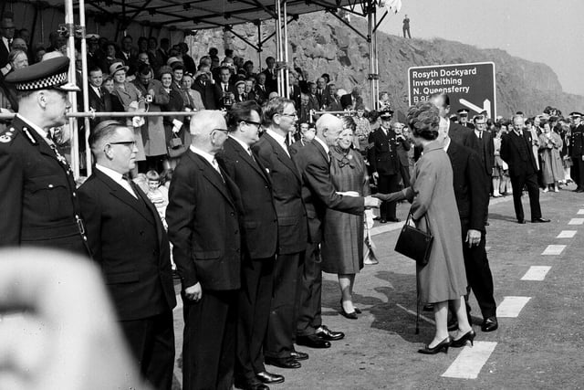 Queen Elizabeth II shakes hands with Sheriff Lillie during the official opening of the Forth Road Bridge in September 1964.