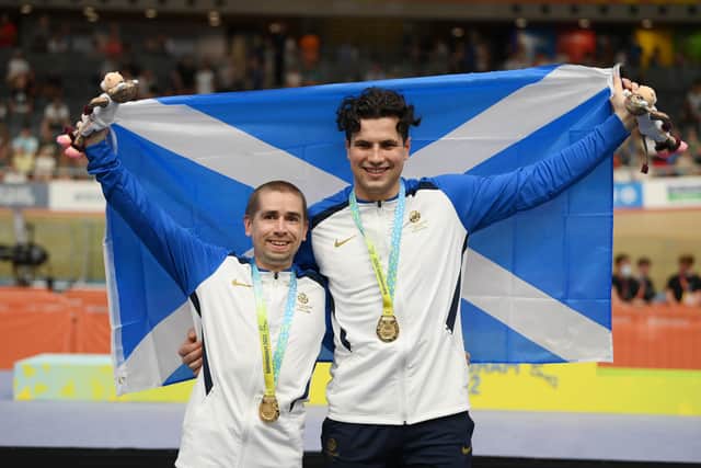 Neil Fachie (left) with his pilot Lewis Stewart after winning gold in the men's para-cycling 1000m time trial. Pic: Alex Broadway/SWpix.com