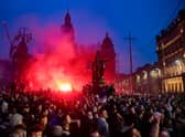 Rangers fans in George Square celebrating their team's title win on Sunday. Picture: SNS