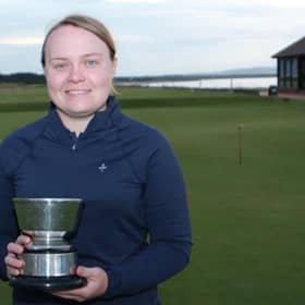 Carrine Taylor shows off the trophy after landing her eighth win in the Nairn ladies' club championship. Picture: Nairn Golf Club