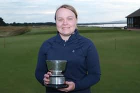 Carrine Taylor shows off the trophy after landing her eighth win in the Nairn ladies' club championship. Picture: Nairn Golf Club