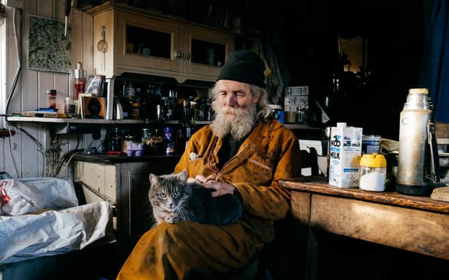 Jake Williams, moved into his off-grid home after falling out with landlords in the ‘70s. The property, located two-miles down a forestry track in Western Aberdeenshire, has no mains electricity, water or conventional sewage system. PIC: Copyright Elliot Caunce.