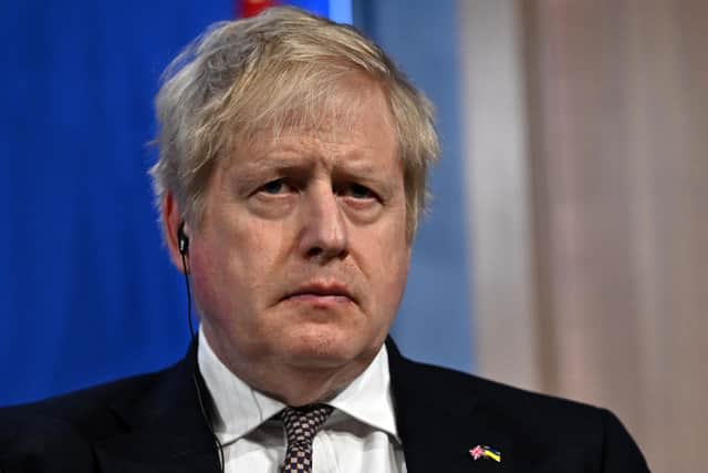 Boris Johnson's government needs to be more active in solving problems like the railway strikes (Picture: Ben Stansall/WPA Pool/Getty Images)
