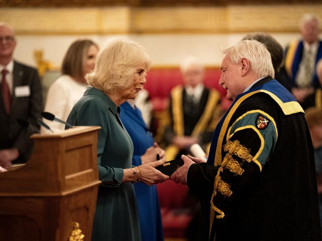 Queen Camilla (left) presents the Queen's Anniversary Prize to representatives from Scotland's Rural College during a ceremony at Buckingham Palace. The college spent £2,007,038 on PR in 2022/23 to be the fifth highest spending Scottish quango. Picture: Aaron Chown/AFP via Getty Images