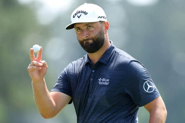 Jon Rahm reacts to holing a putt during the first round at Augusta National Golf Club. Picture: Andrew Redington/Getty Images.