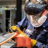 A Babcock International apprentice metal cutting.