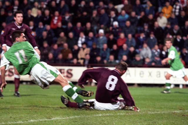 Pat McGinlay - seen here scoring against Hearts in 1998 - was a prodigious goalscorer from midfield in his two spells at Hibs