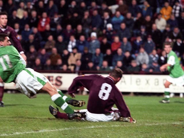 Pat McGinlay - seen here scoring against Hearts in 1998 - was a prodigious goalscorer from midfield in his two spells at Hibs