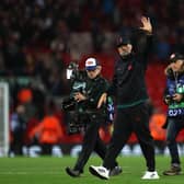 Jurgen Klopp, Manager of Liverpool acknowledges the fans after their side's victory during the UEFA Champions League group A match between Liverpool FC and Rangers FC at Anfield on October 04, 2022 in Liverpool, England. (Photo by Clive Brunskill/Getty Images)