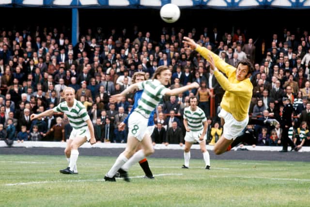 Peter McCloy makes a save for Rangers in 1973 as Celtic's Jimmy Johnstone (left) looks on.