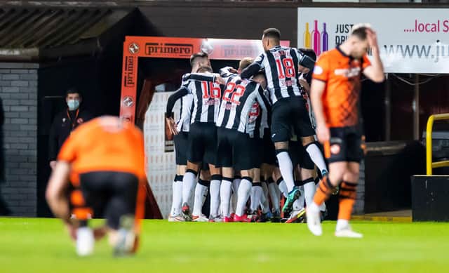 St Mirren players celebrate after Jay Henderson put his side 1-0 up at Dundee United. (Photo by Roddy Scott / SNS Group)
