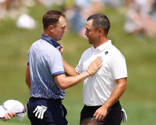 Justin Thomas congratulates playing partner Xander Schauffele on his flying start in the 106th PGA Championship at Valhalla Golf Club in Louisville, Kentucky. Picture: Christian Petersen/Getty Images.