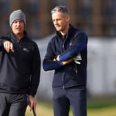 Nicolas Colsaerts and Tom Chaplin, lead singer of Keane, talk on the 17th green at St Andrews during day one of 20th Alfred Dunhill Links Championship. Picture: Richard Heathcote/Getty Images.
