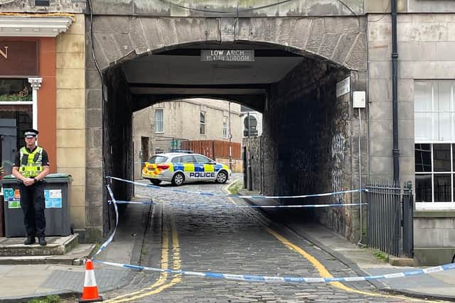 Police have sealed off Broughton Street Lane as they carry out their enquiries.