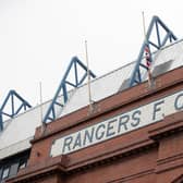 The Union Jack outside Ibrox stadium, home of Rangers, has been lowered to half mast following the death of Queen Elizabeth II. (Photo by Craig Williamson / SNS Group)