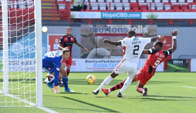 Jonathan Obika stabs the ball over the line for the only goal of the game. Picture: SNS