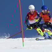 Neil Simpson and brother Andrew en route to winning bronze in the Para Alpine Skiing Men's Super Combined Slalom Vision Impaired at Yanqing National Alpine Skiing Centre during day three of the Beijing 2022 Winter Paralympics. (Photo by Alexander Hassenstein/Getty Images)